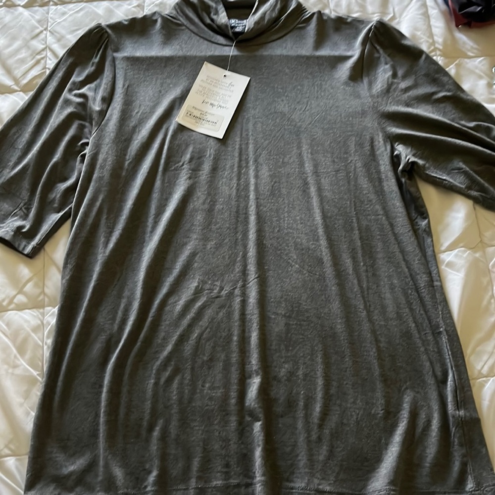 Brand new with tag short sleeve mock T-shirt.